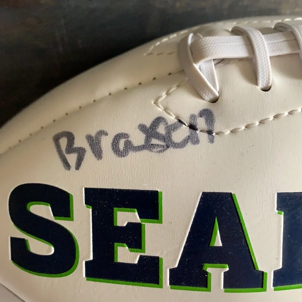 2005 NFC Champions Seahawks football with signatures read below